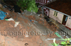 Mangalore: Portion of under construction building collapses over compound wall of house